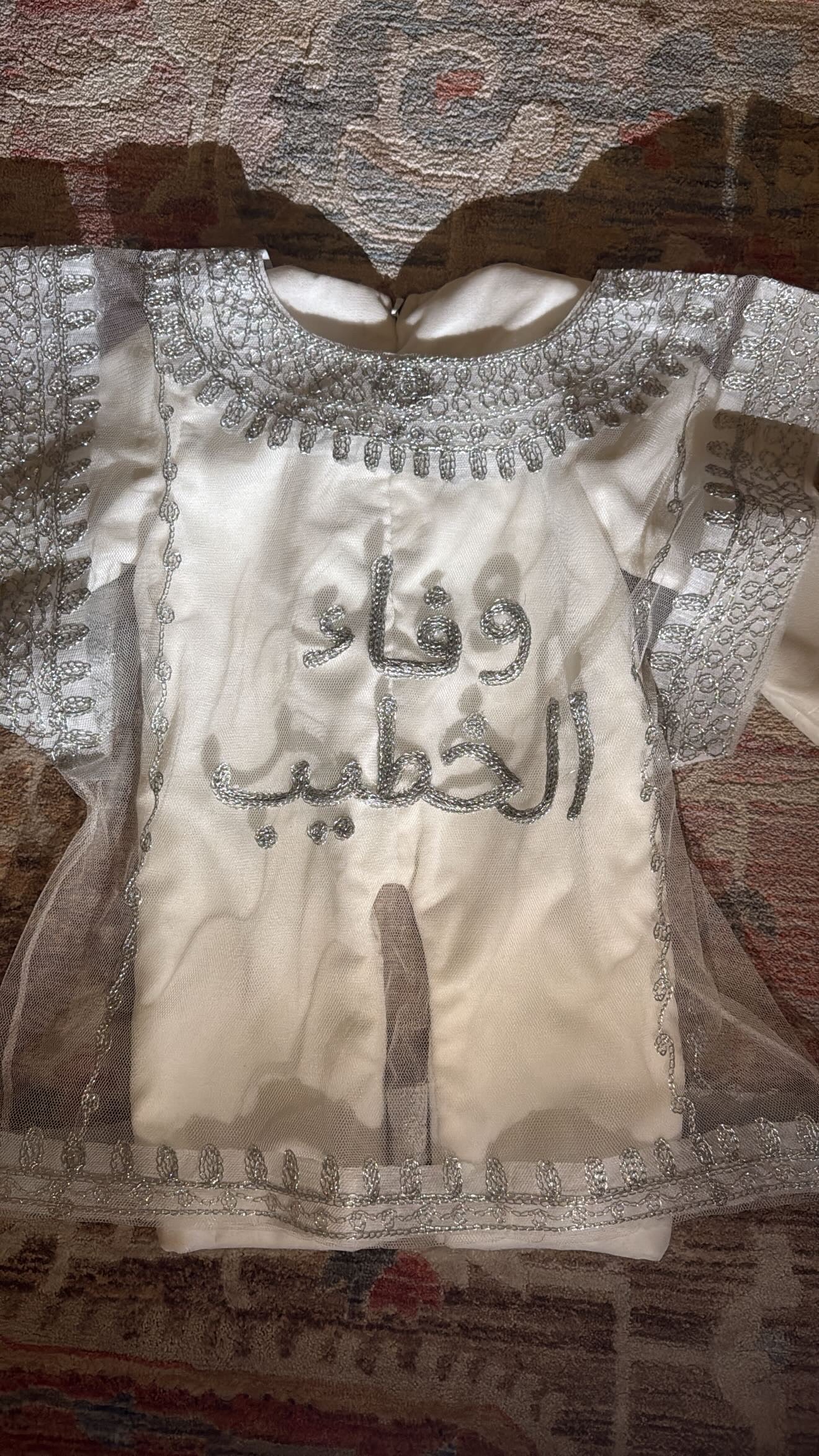 Thoub and jumpsuit